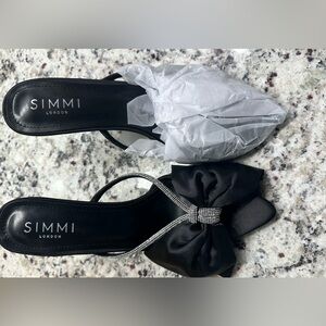 SIMMI LONDON Black bow sandals with rhinestone detail